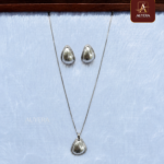 Silver Tear Drop Necklace And Earrings